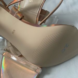 Guess high heels, brand new, color of pink silver Holographic 9 4 1/2 heel .